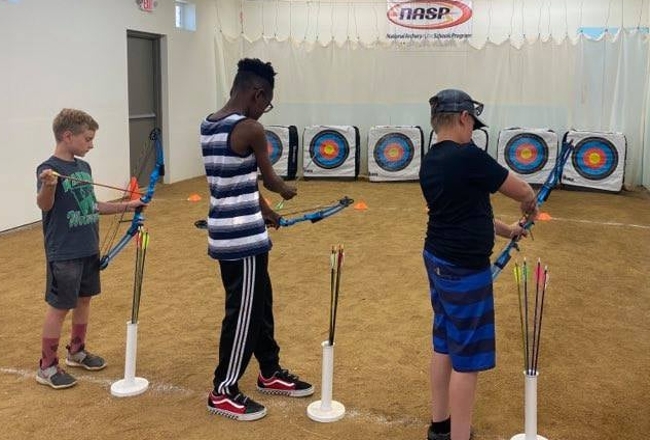 Kids at archery range