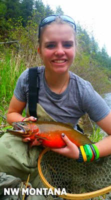 girl holding trout