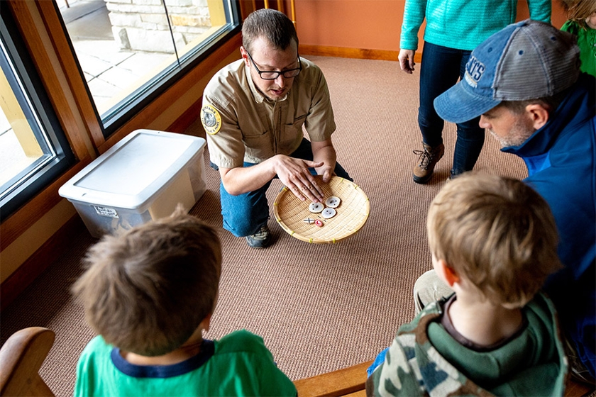 A park ranger teaches students at First Peoples Buffalo Jump
