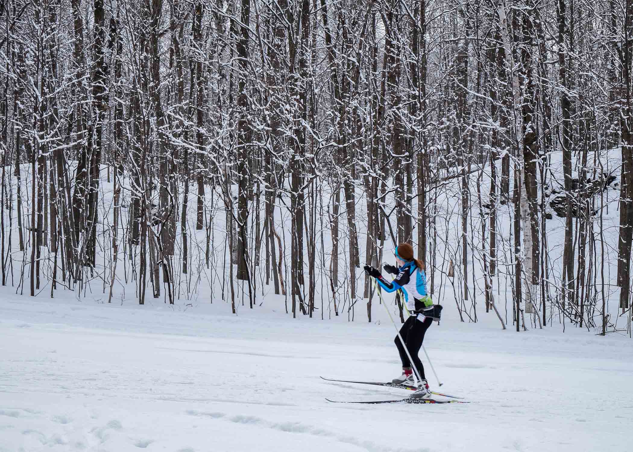 Person cross country skiing