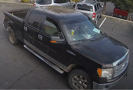 Photo of black Ford pickup truck