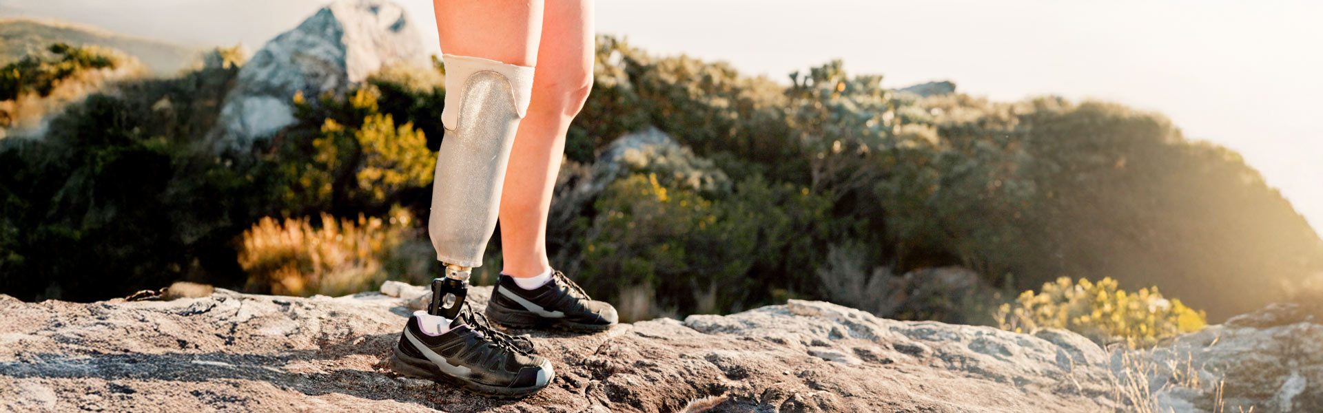 Closeup photo of hiker with prosthetic leg.
