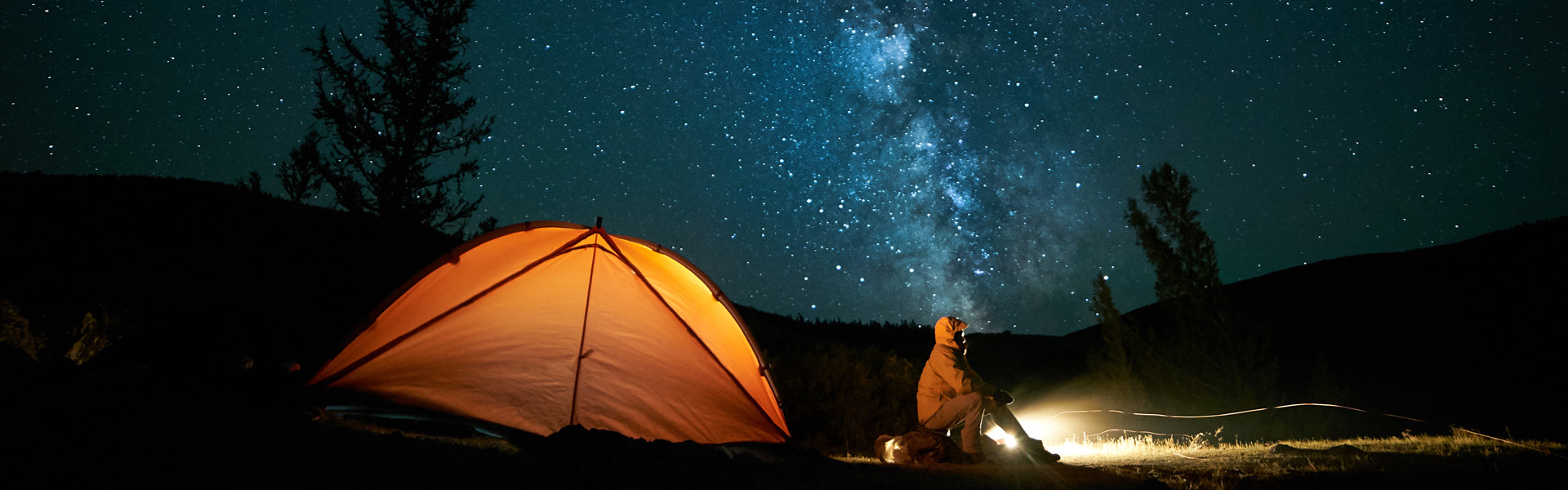 Tent camping at night.