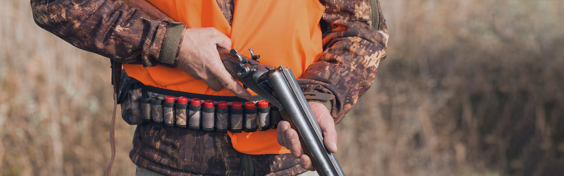 Closeup of hunter with shotgun